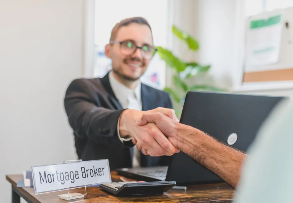 PRIA insurance broker consulting with a client